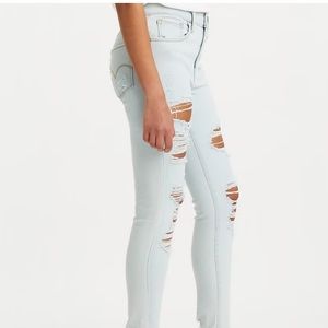 LEVIโs 721 high rise distressed skinny jeans